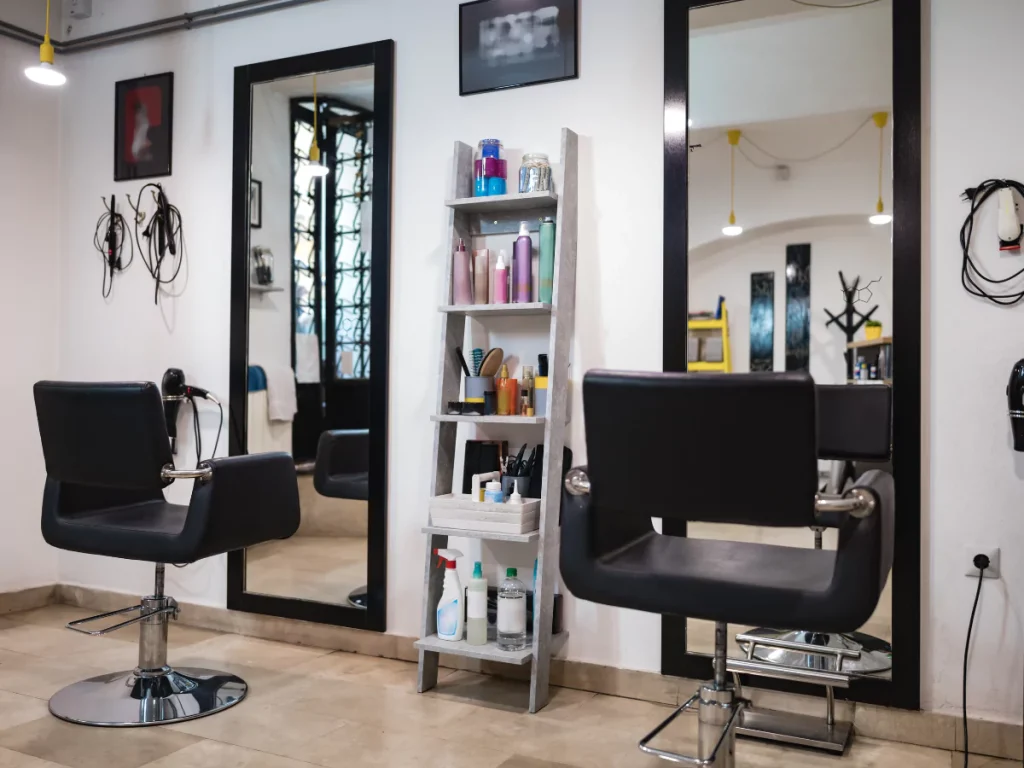 Clean and professional Hair Salons for Men in Houston featuring a well-organized product shelf